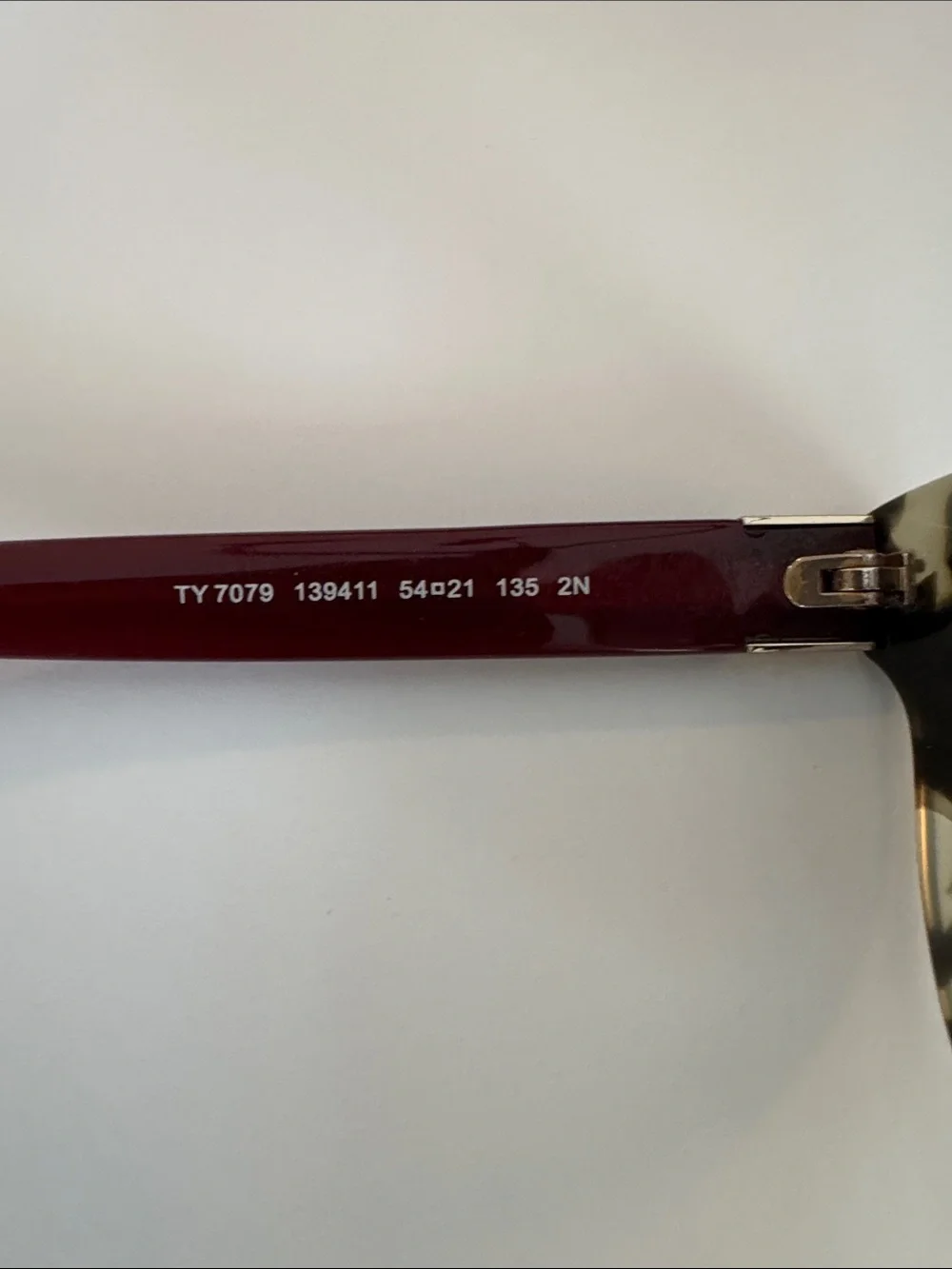 Tory Burch sunglasses.
